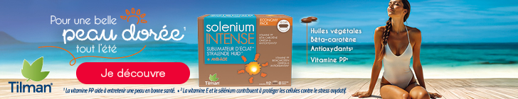 Bannière de Tillman. La mer en arrière-plan. À droite, une femme en maillot de bain profite du soleil. Au centre: « Huiles végétales - Bêta-carotène - Antioxydants2 - Vitamine PP1 ». Au centre se trouve un emballage de Solentium Intense. En haut à droite, on peut lire : « Pour une belle peau dorée1 tout l'été ». À droite un bouton rouge : « Je découvre ».