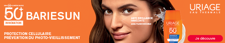Bannière avec à gauche le logo URIAGE EAU THERMALE et le texte « 50+ BARIESUN - INNOVATION ». En bas à gauche « PROTECTION CELLULAIRE PRÉVENTION DU PHOTO-VIEILLISSEMENT ». À droite un gros plan d’un visage féminin avec des éclaboussures d’eau et un flacon URIAGE BARIESUN 50+.« ANTI-BRILLANCE IMMÉDIATE AQUA FLUIDE INVISIBLE ». En bas un bouton rouge « Je découvre ».