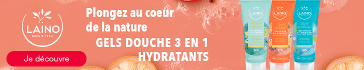 Banni&egrave;re sur fond rose avec de la mousse, des agrumes et une grenade. &Agrave; gauche figure le logo &laquo; LAINO DEPUIS 1954 &raquo;. Au centre appara&icirc;t le texte &laquo; Plongez au c&oelig;ur de la nature GELS DOUCHE 3 EN 1 HYDRATANTS &raquo;. &Agrave; droite sont pr&eacute;sent&eacute;s trois tubes de gels douche Laino en diff&eacute;rentes variantes. En bas un bouton rouge &laquo; Je d&eacute;couvre &raquo;.